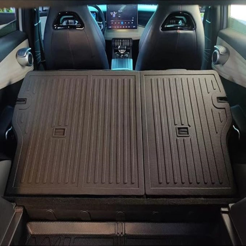 BYD ATTO 3 Back Seat Protector Mat fitted, tailored durable black mat designed for spill and dirt protection in electric vehicle back seats.