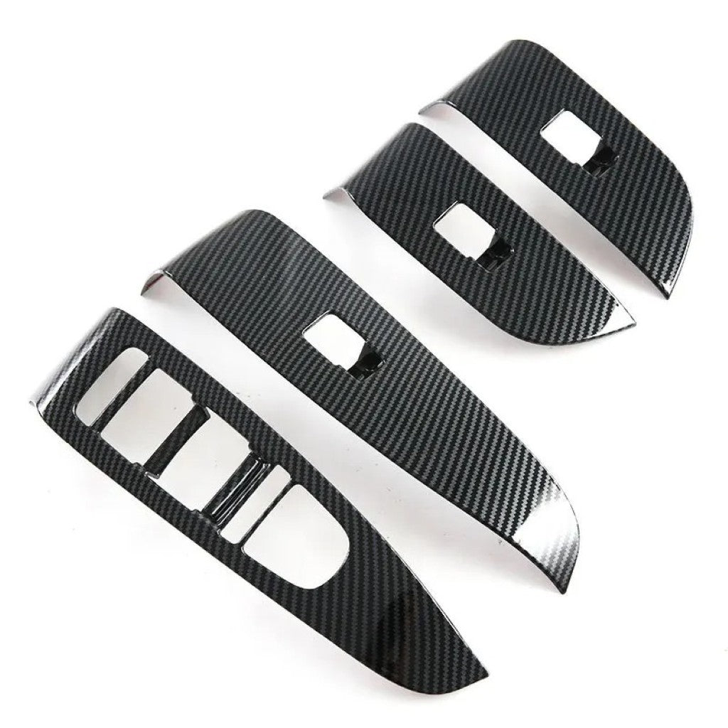 BYD Sealion 7 Armrest Window Riser Trim Covers in black ABS carbon fibre, custom fit for sleek interior upgrade