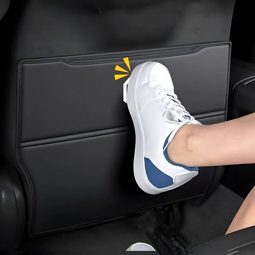 MG4 Back Seat Anti Kick Pad Cushion in black leather protecting front seat from scuffs and dirt inside electric vehicle.