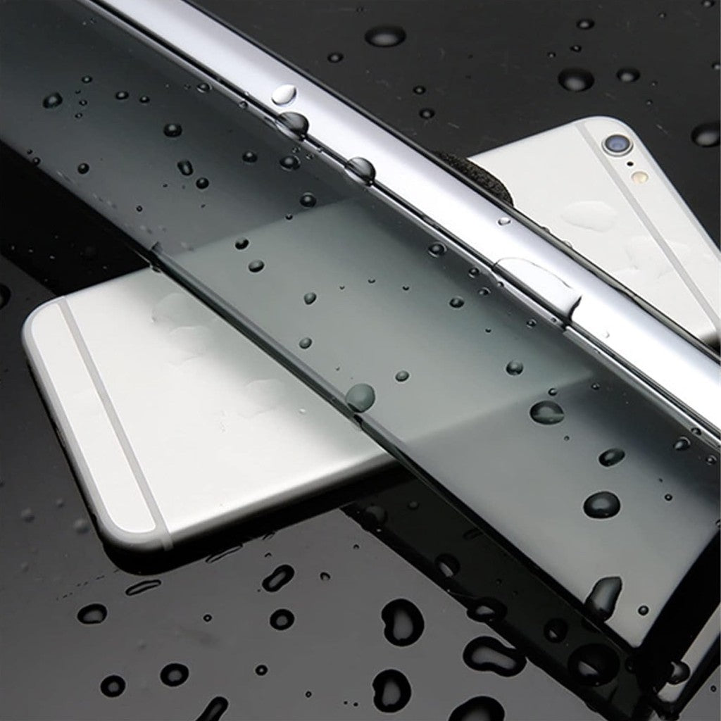 MG4 Rain Visor Windshield Guard showing water droplets on sleek polycarbonate surface for electric vehicle protection.