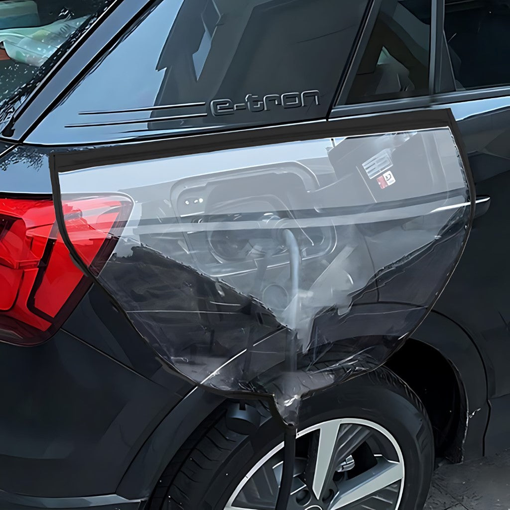 XPENG G6 Waterproof Charging Port Rain Cover protecting the charging socket from rain and dust on a black electric vehicle.