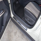 BYD Dolphin Outer Door Sill Guards installed, showing durable ABS imitation carbon protection on vehicle door sill.