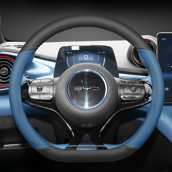 BYD Dolphin Steering Wheel Cover in black and blue PU leather installed on a BYD Dolphin electric vehicle steering wheel.