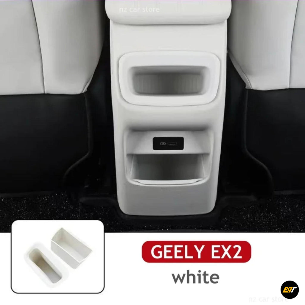 White centre console storage compartments shown in a Geely EX2 interior with matching removable organiser trays
