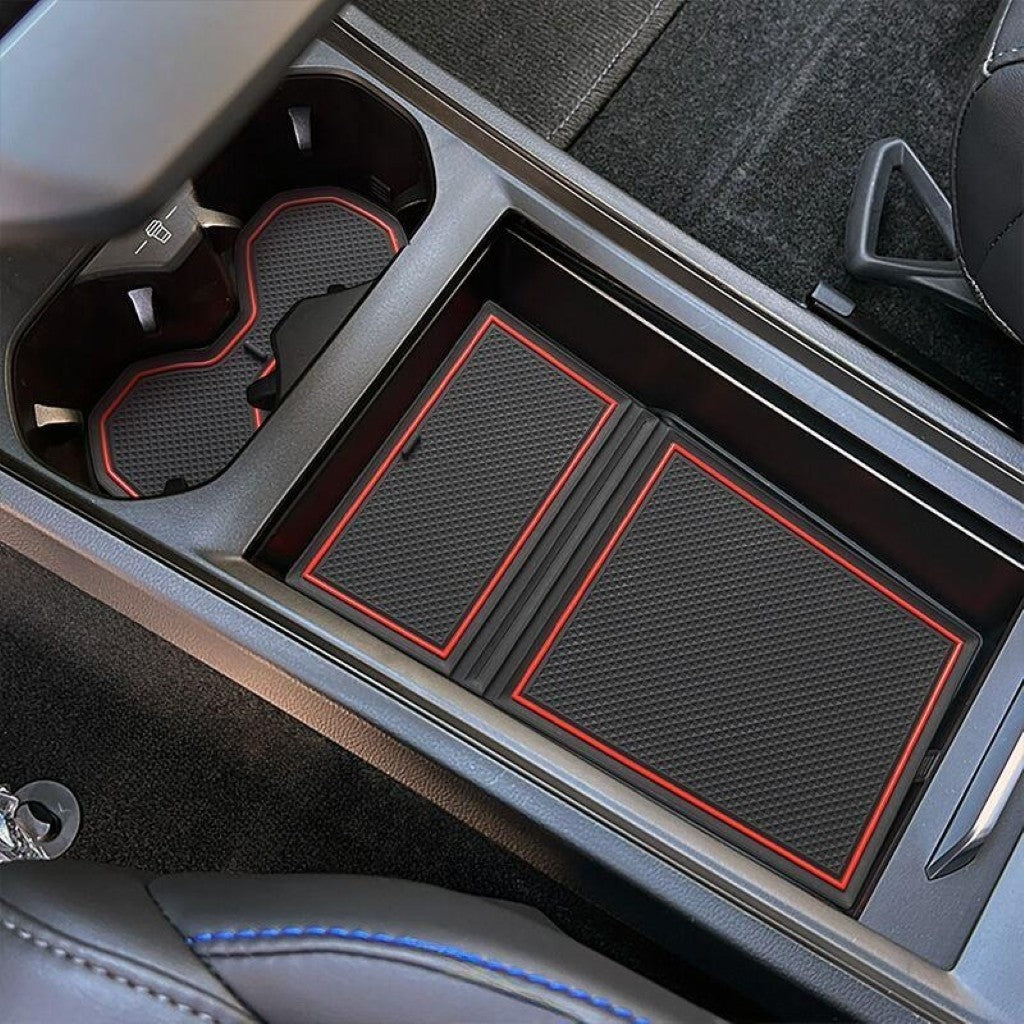 Anti-slip black and red trimmed mats installed in MG4 2022-2024 door groove and cup holder compartments interior