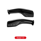 A pair of black exhaust pipes for the Tesla Model 3/Y Steering Wheel Gear Shift Protection Cover, ensuring easy installation and maintenance.