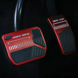 A pair of red Tesla Model 3/Y Anti Slip Foot Pedal Pads on a black background with Easy Installation.