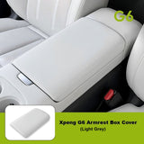 XPENG G6 Armrest Box Protective Cover in light grey, custom fit, premium leather, durable interior accessory.