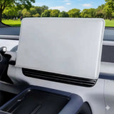 Protective white screen cover installed on a car dashboard touchscreen in a modern electric vehicle interior