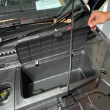 BYD Dolphin Front Storage Box (Frunk) open inside front trunk, showing durable black plastic organiser for RHD model