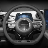 BYD Dolphin Steering Wheel Cover in black PU leather, custom fit for BYD Dolphin, enhancing grip and interior style.