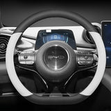BYD Dolphin Steering Wheel Cover in black and white PU leather, custom-fit for enhanced grip and style in electric vehicles.