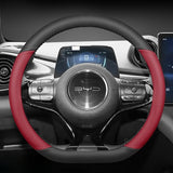 BYD Dolphin Steering Wheel Cover in black and red PU leather, custom fit for enhanced grip and protection in electric vehicles.