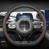 BYD Dolphin Steering Wheel Cover in PU leather, custom-fit for enhanced grip and protection in electric vehicle interiors.