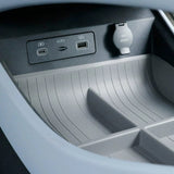 BYD Seal Centre Console Lower Storage Box showing organised storage with USB ports and 12V power socket in electric vehicle interior.