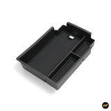 Black plastic centre console organiser tray with multiple compartments for vehicle storage accessories