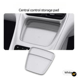 White textured central control storage pad shown fitted in a vehicle centre console with the removable tray displayed below