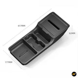 Black moulded vehicle storage organiser tray with multiple compartments and integrated cup holder sections