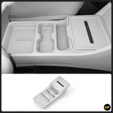 White centre console storage organiser tray with moulded compartments, cup holders and a sliding covered section
