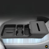 Centre console organiser with cup holders storage compartments and covered tray fitted in a modern car interior