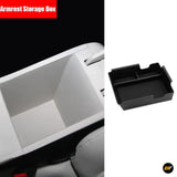Black armrest storage box insert tray fitted inside a vehicle centre console compartment