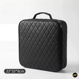 Black quilted storage case with carry handle and zip closure, measuring 33 by 33 by 9 centimetres