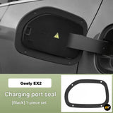 Black charging port seal fitted to a Geely EX2 electric vehicle, shown as a one piece replacement seal set