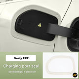 Geely EX2 electric vehicle charging port seal in Vanilla Beige, shown fitted around the black charging socket cover