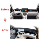 Before and after comparison of a car dashboard showing the original centre display and a larger touchscreen interior display