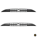 Pair of black automotive grille panels with segmented rectangular openings and distinctive central cross-shaped details