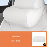 White perforated car seat headrest accessory shown fitted to a vehicle seat, single piece