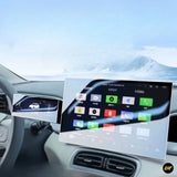 Car dashboard touchscreen displaying navigation, phone and media apps beside a digital instrument display