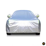 Silver protective car cover fitted over a vehicle, with side mirrors and front wheels visible