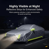 Reflective car cover with high visibility strips illuminated at night to enhance vehicle safety in dark environments