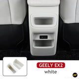 White centre console storage compartments shown in a Geely EX2 interior with matching removable organiser trays