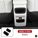 Geely EX2 black rear centre console insert set shown fitted between the rear seats