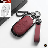 Red leather style electric vehicle key fob cover with matching wrist strap, metal clips and Type G remote control inset