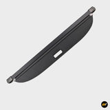 Black retractable vehicle cargo cover with central pull handle and secure end fittings
