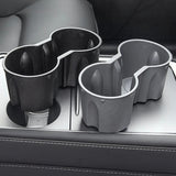 Two Tesla Model 3/Y Water Cup Holders on the Centre Console Water Cup Holder of a Tesla provide a convenient driving experience.