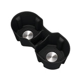 Black rear armrest cup holder with stainless steel inserts, designed for secure beverage placement in electric vehicles.
