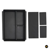 Black plastic centre console organiser tray and three non-slip rubber inserts for vehicle storage compartments