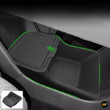 Black lower armrest storage box with sliding cover for electric vehicle centre console, featuring textured grip surface.