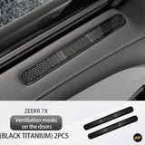 Black titanium ventilation covers installed on Zeekr 7X car door air vents with perforated design