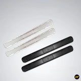 Set of black and white air vent protection covers with perforated design for vehicle door ventilation panels