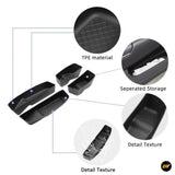 Black TPE material car door side storage boxes with textured non-slip surface and separated compartments for organisation