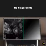 Car dashboard touchscreen protector showing fingerprint resistance on one side and fingerprints on the other side