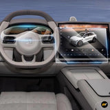 Interior view of electric vehicle dashboard with protective screens on Zeekr 7X steering and central touchscreen panel