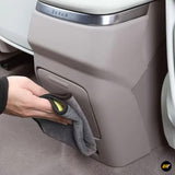 Cleaning the beige rear exhaust air outlet frame cover of a Zeekr electric vehicle interior panel