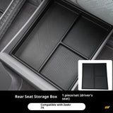 Black under-seat rear seat storage organiser box for Zeekr 7X electric vehicle driver’s seat compartment