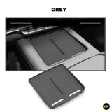 Grey silicone anti-slip pad designed for wireless charging in electric vehicle central console accessories.